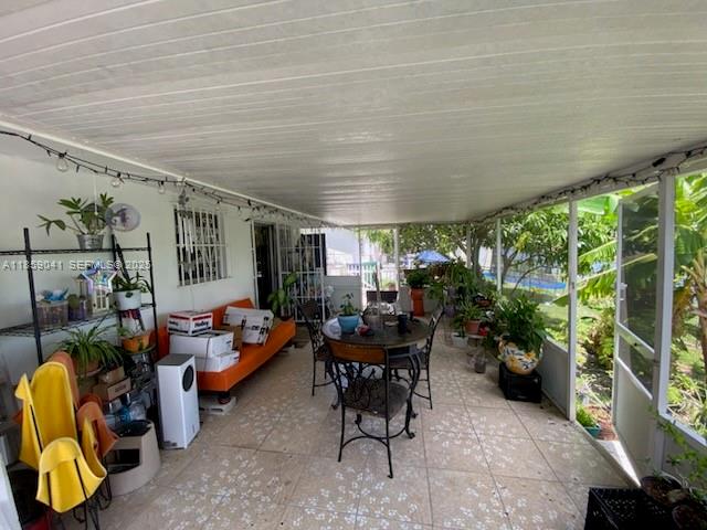25931 Southwest 130th Avenue Homestead, FL 33032 - Photo 14 of 44 a outdoor space with furniture