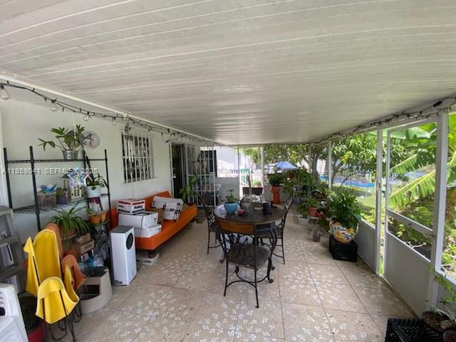 25931 Southwest 130th Avenue Homestead, FL 33032 - Photo 15 of 44 a outdoor space with furniture