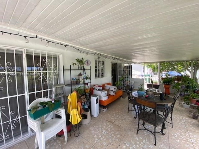 25931 Southwest 130th Avenue Homestead, FL 33032 - Photo 16 of 44 a living room filled with furniture
