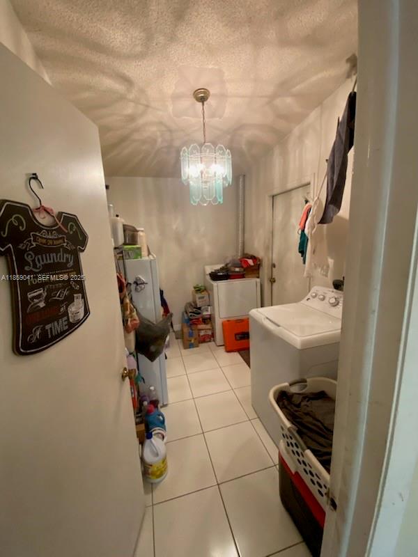 25931 Southwest 130th Avenue Homestead, FL 33032 - Photo 21 of 44 a bathroom with a sink and a mirror