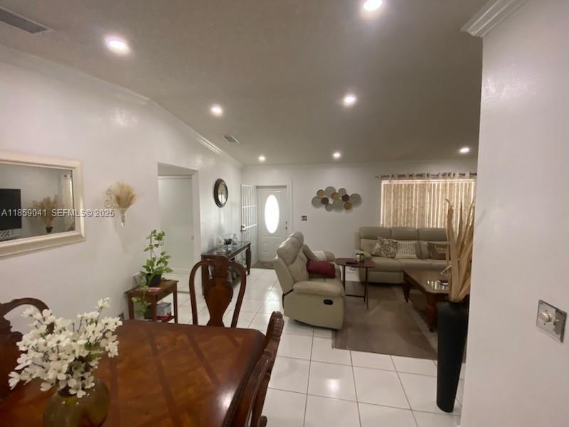 25931 Southwest 130th Avenue Homestead, FL 33032 - Photo 27 of 44 a living room with furniture