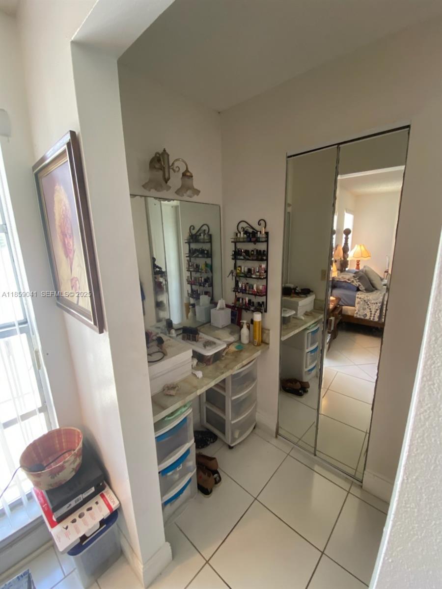 25931 Southwest 130th Avenue Homestead, FL 33032 - Photo 30 of 44 a kitchen with stainless steel appliances a refrigerator and a sink
