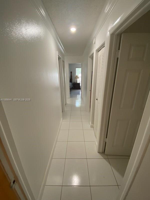 25931 Southwest 130th Avenue Homestead, FL 33032 - Photo 42 of 44 a view of hallway with stairs