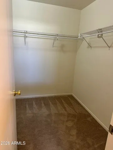 a bathroom with a sink vanity and mirror