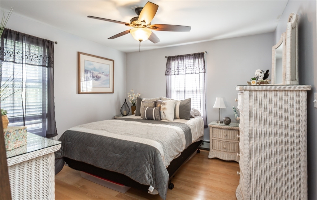 12 Elderberry Drive Acushnet, MA 02743 - Photo 16 of 41 a bedroom with a bed and a window