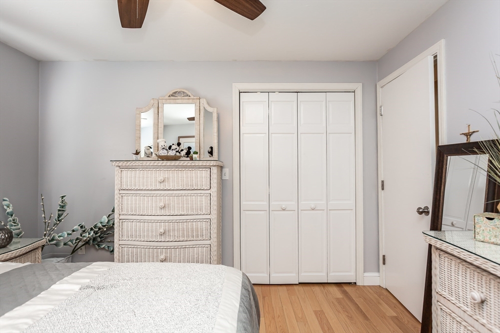 12 Elderberry Drive Acushnet, MA 02743 - Photo 17 of 41 a bedroom with a bed and a dresser