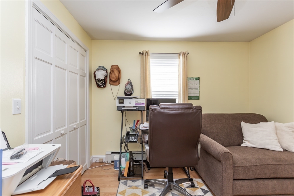 12 Elderberry Drive Acushnet, MA 02743 - Photo 21 of 41 a living room with furniture and a window