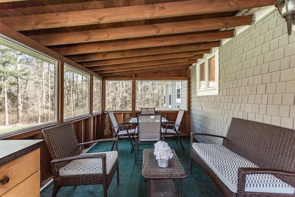 12 Elderberry Drive Acushnet, MA 02743 - Photo 22 of 41 a living room with furniture and a large window