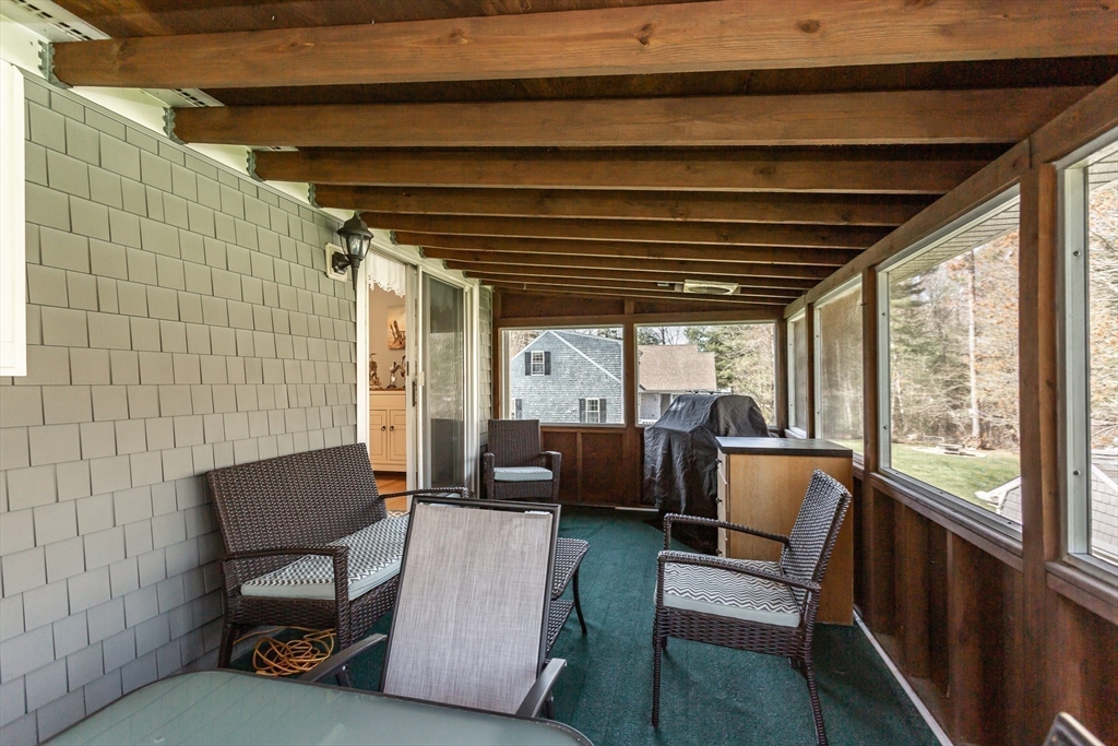 12 Elderberry Drive Acushnet, MA 02743 - Photo 23 of 41 a living room with furniture and a large window