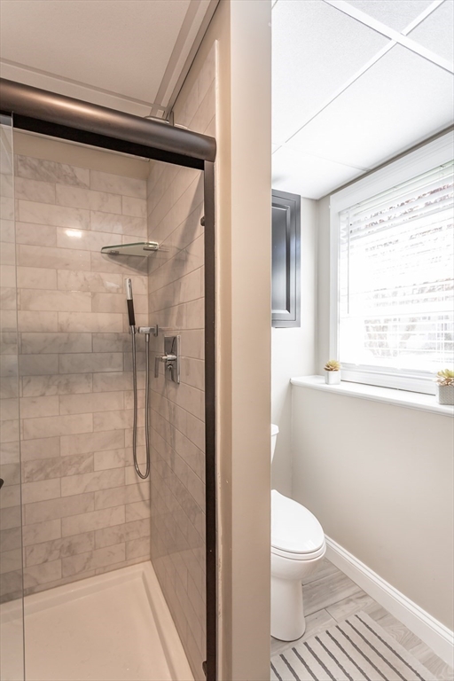 12 Elderberry Drive Acushnet, MA 02743 - Photo 27 of 41 a bathroom with a toilet and a shower