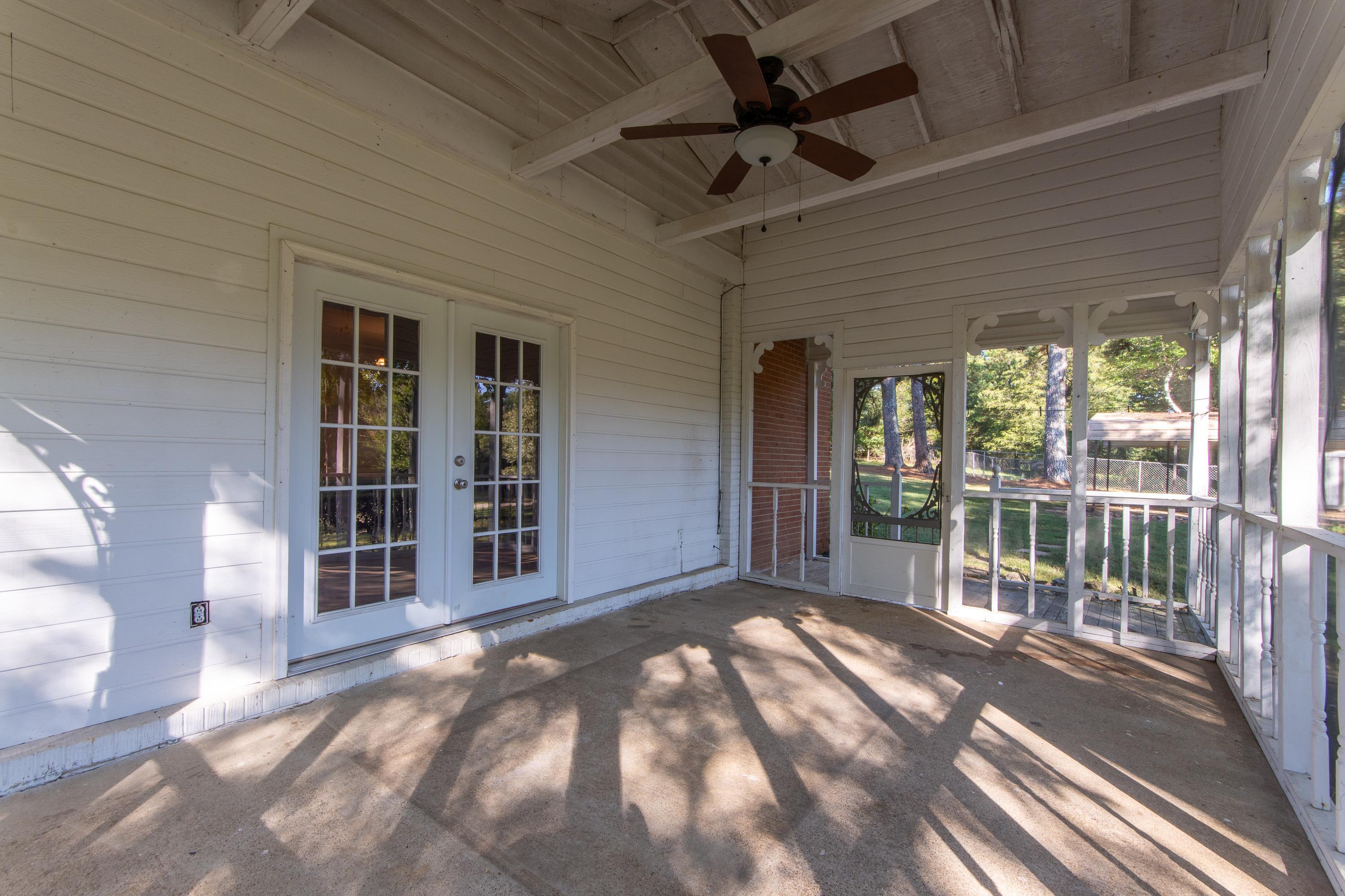 4155 Clifton Road Savannah, TN 38372 - Photo 25 of 40 Unfurnished sunroom with ceiling fan, beamed ceiling, wood ceiling, and french doors