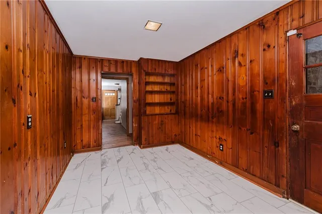 an empty room with windows