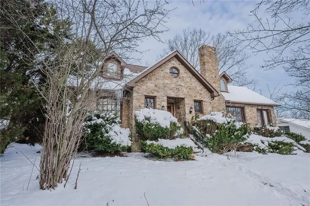 front view of a house with a yard