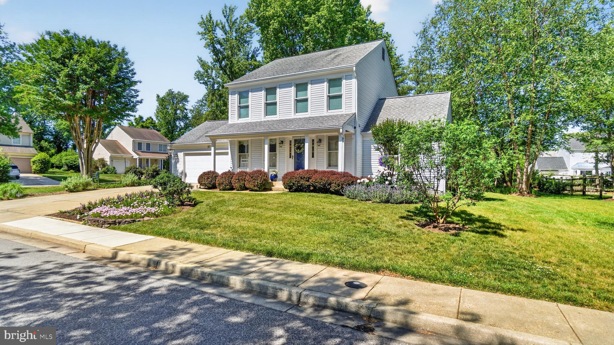 317 Canterfield Road Annapolis, MD 21403 - Photo 3 of 66 a front view of a house with garden