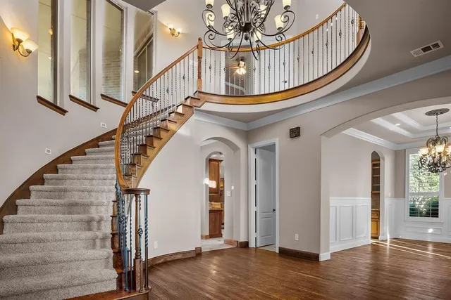 a view of entryway with wooden floor