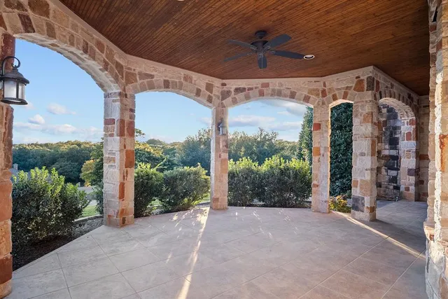 a view of a swimming pool with a yard