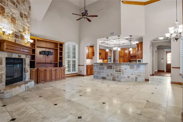 a view of a living room and chandelier