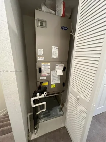 a view of a hallway with workspace