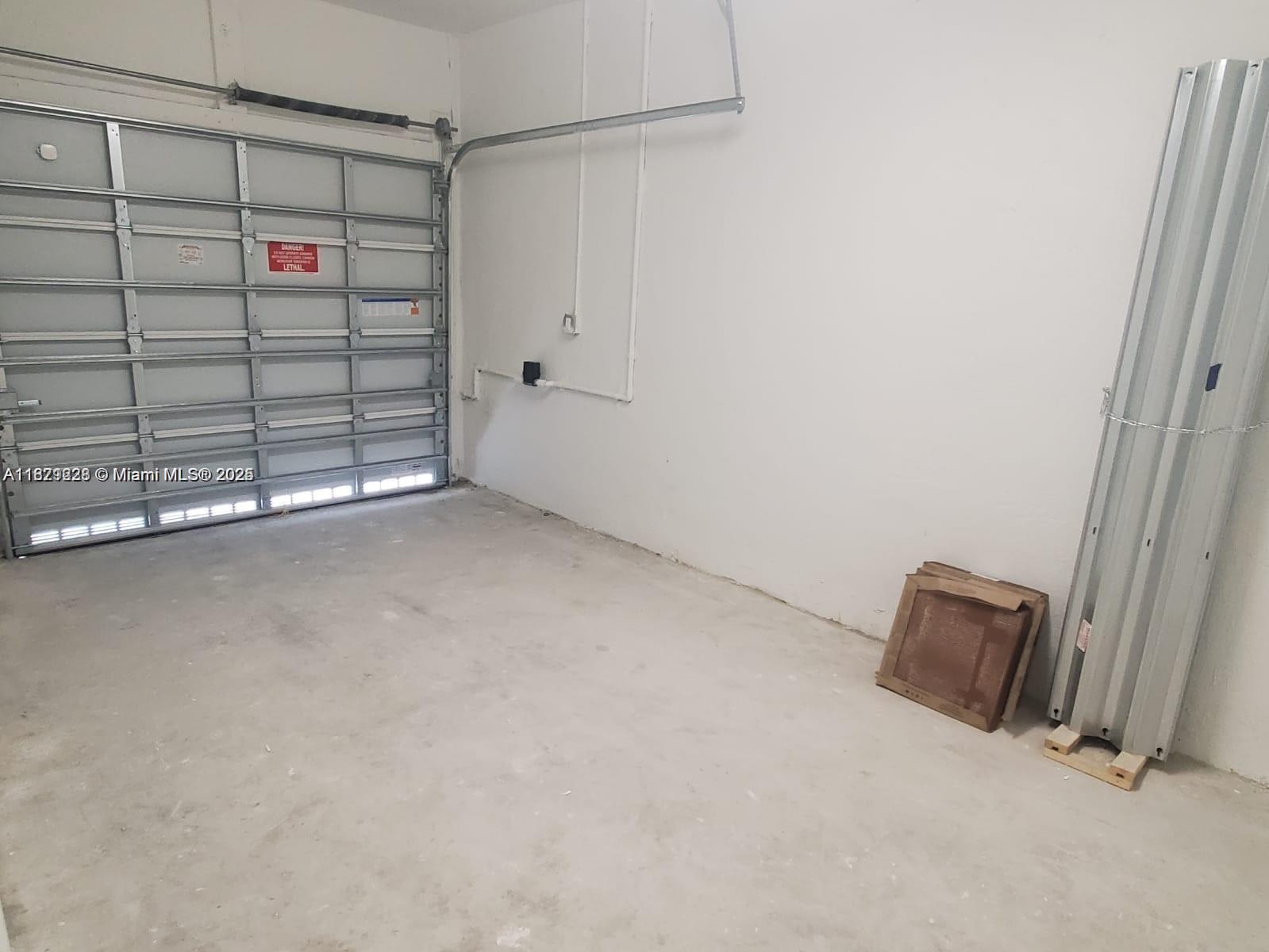 2602 Southeast 11th Street, Unit 2602 Homestead, FL 33035 - Photo 9 of 22 a view of an empty room