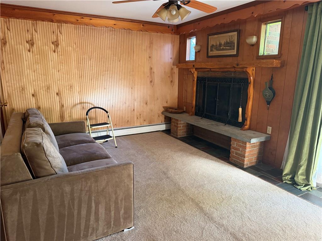 3137 Harts Run Road Allison Park, PA 15101 - Photo 11 of 11 a room with a couch and a fireplace