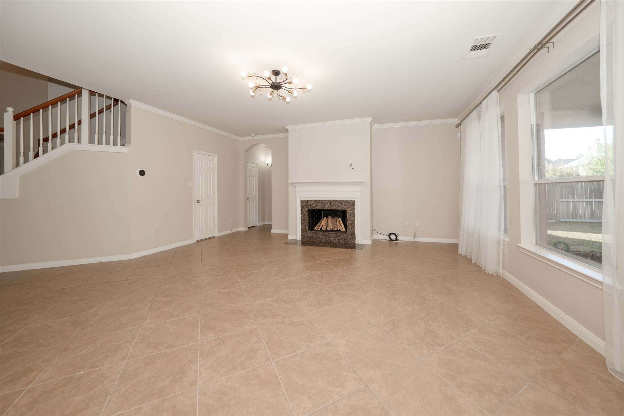 4415 Eden Point Lane Katy, TX 77494 - Photo 7 of 13 a view of empty room with a fireplace