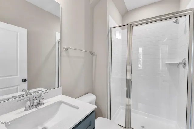 a view of a kitchen with a sink and a stove top oven
