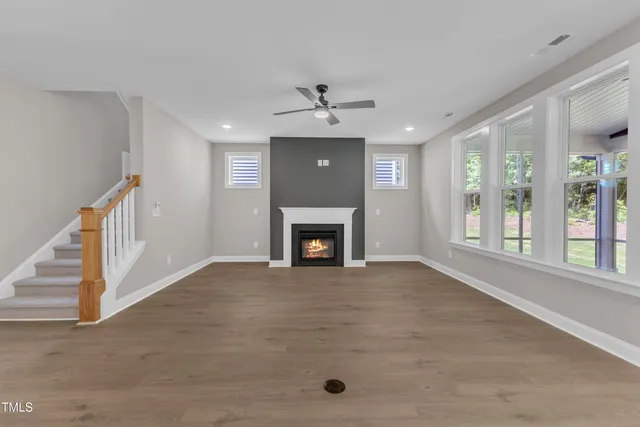a view of a kitchen counter a sink and a chandelier