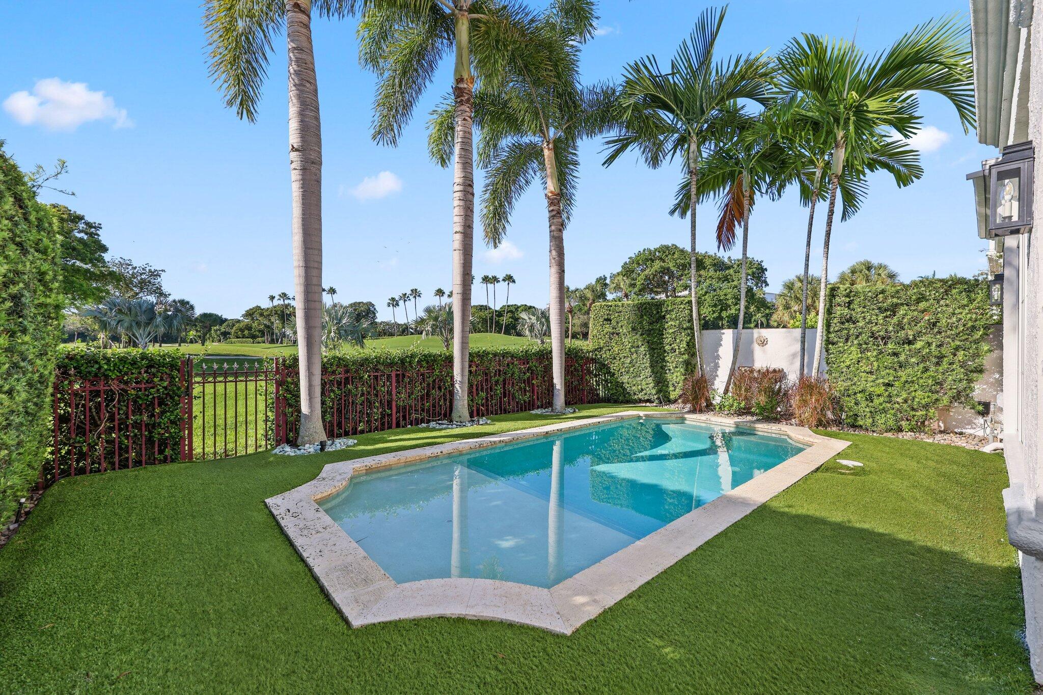 340 East Royal Palm Road Boca Raton, FL 33432 - Photo 5 of 44 a view of a backyard with swimming pool