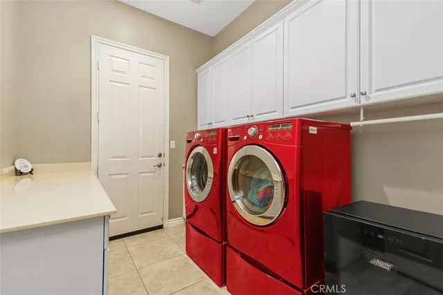 a bathroom with a sink mirror vanity and toilet