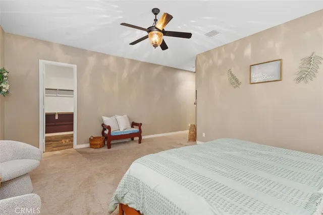 a spacious bathroom with a tub sink shower and mirror