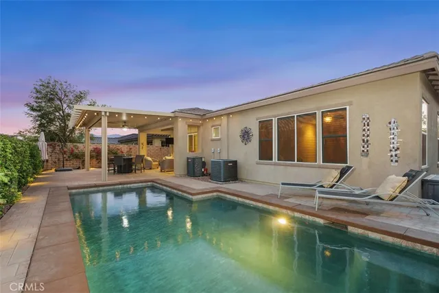 a view of a patio with a backyard