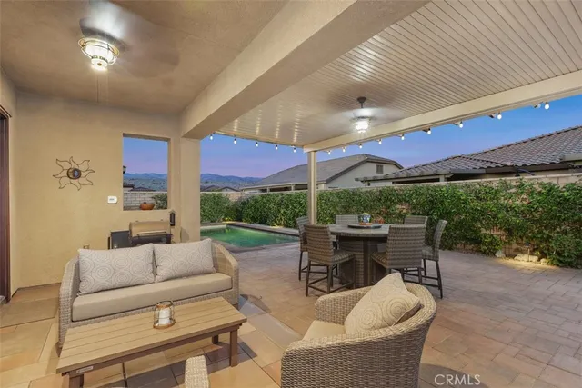a view of a house with pool porch and a yard