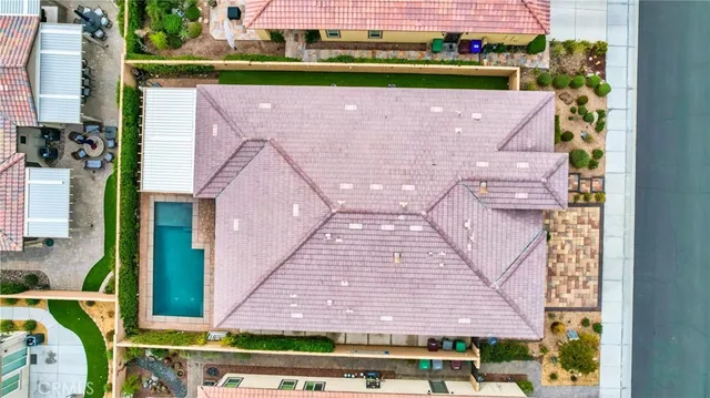 an aerial view of residential building with lake view