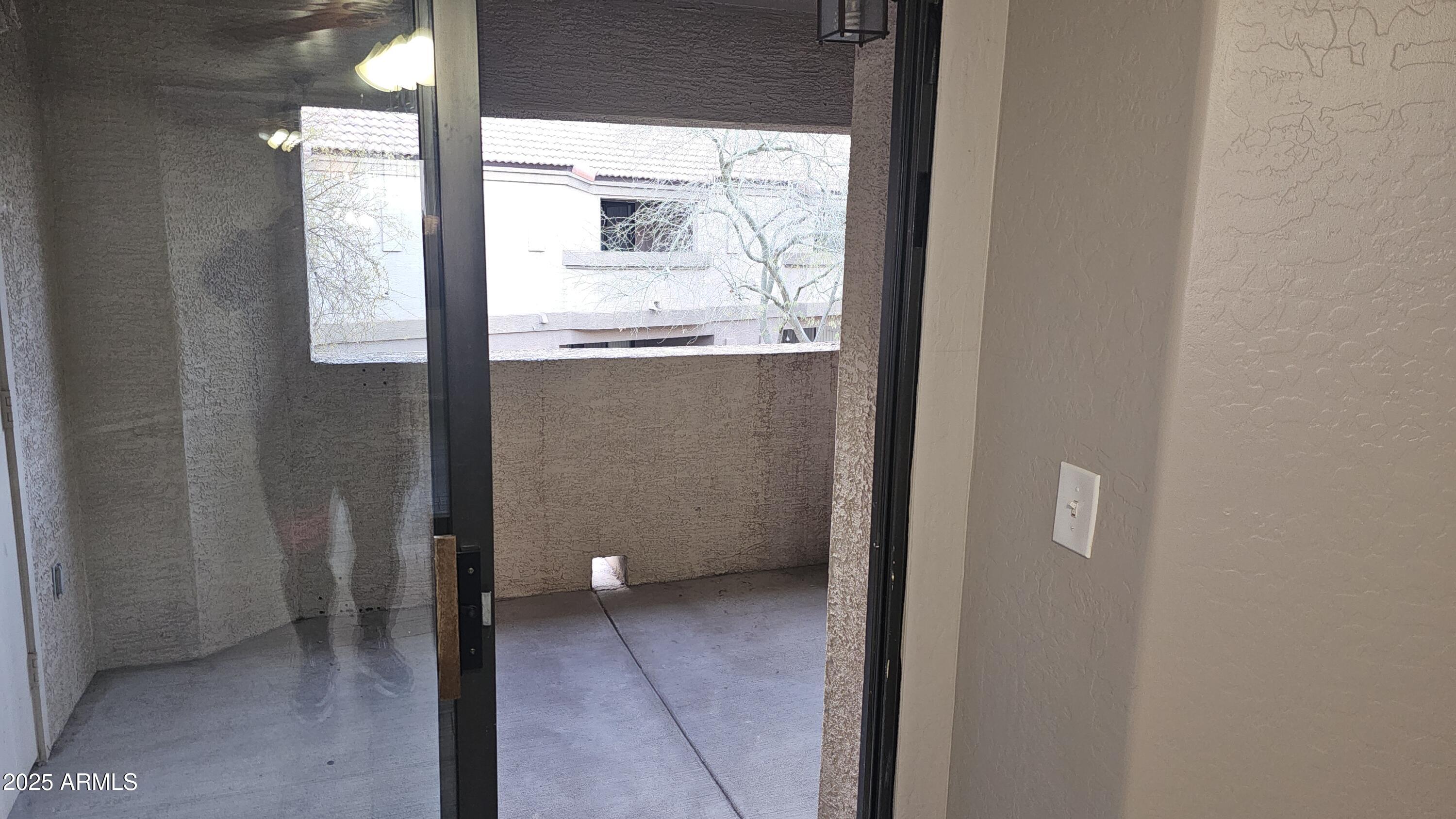 1287 North Alma School Road, Unit 262 Chandler, AZ 85224 - Photo 10 of 19 a view of a bathroom with a glass door