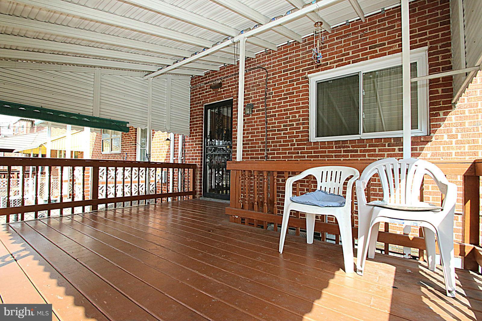 7877 Kavanagh Road Baltimore, MD 21222 - Photo 24 of 30 Covered Rear Deck