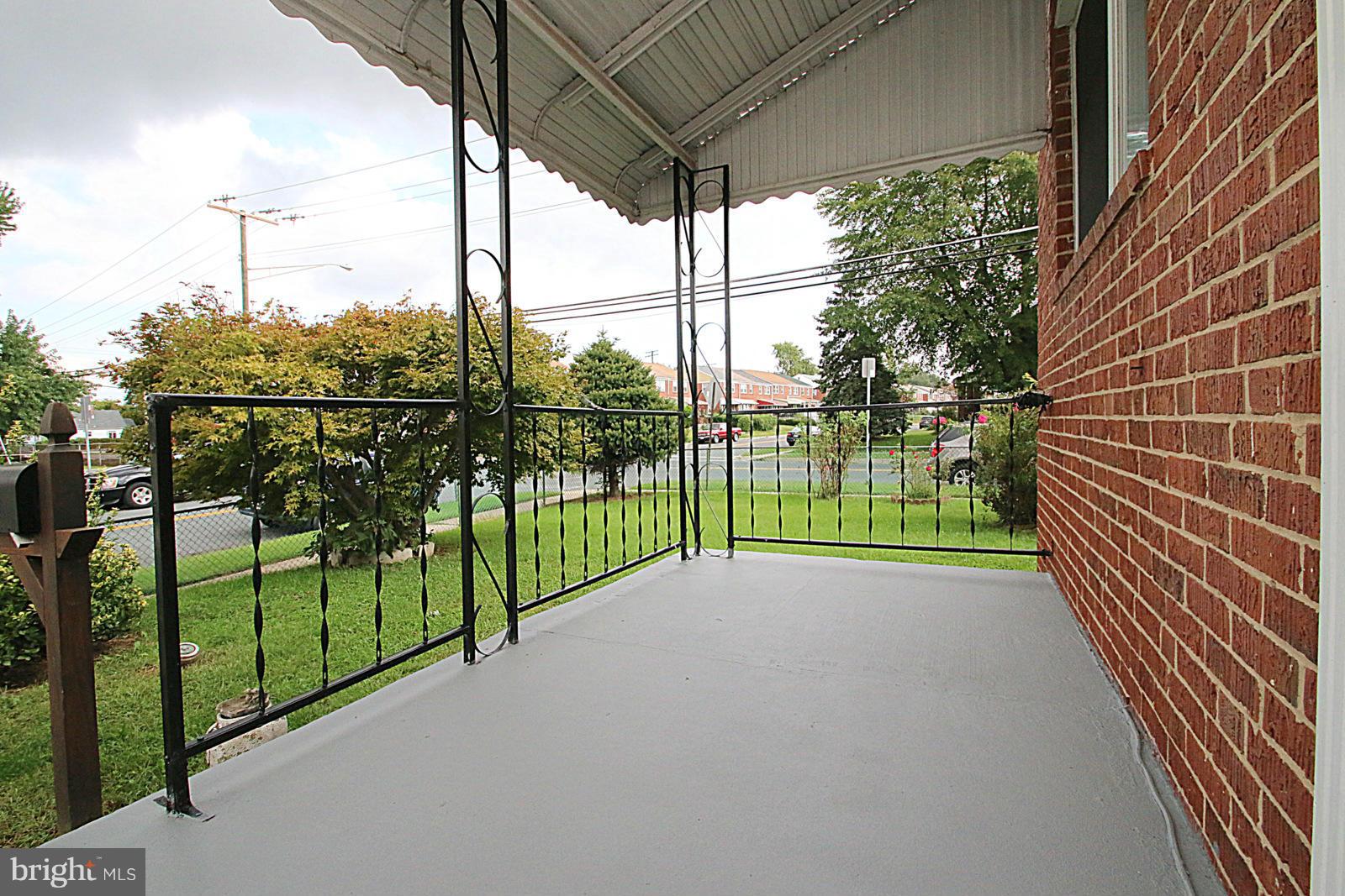 7877 Kavanagh Road Baltimore, MD 21222 - Photo 29 of 30 Covered Front Porch
