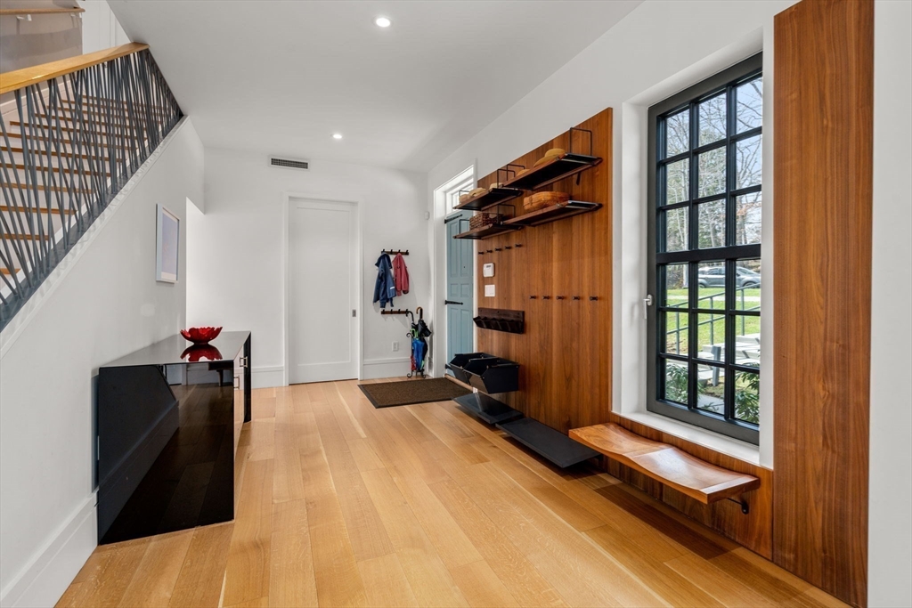 33 Leicester Street Brookline, MA 02445 - Photo 24 of 38 a view of a hallway with workspace