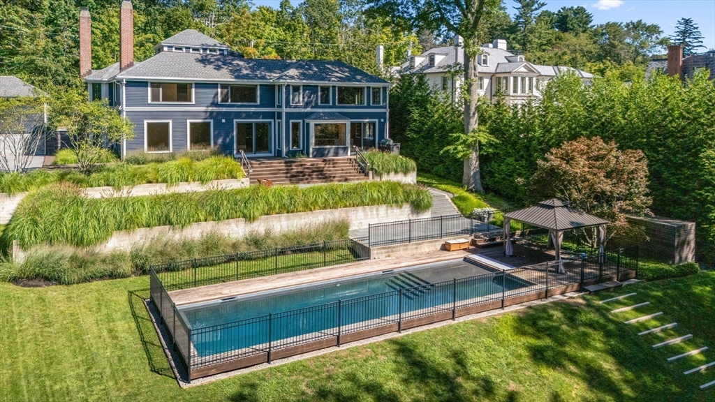 33 Leicester Street Brookline, MA 02445 - Photo 28 of 38 a view of a house with a yard and sitting area