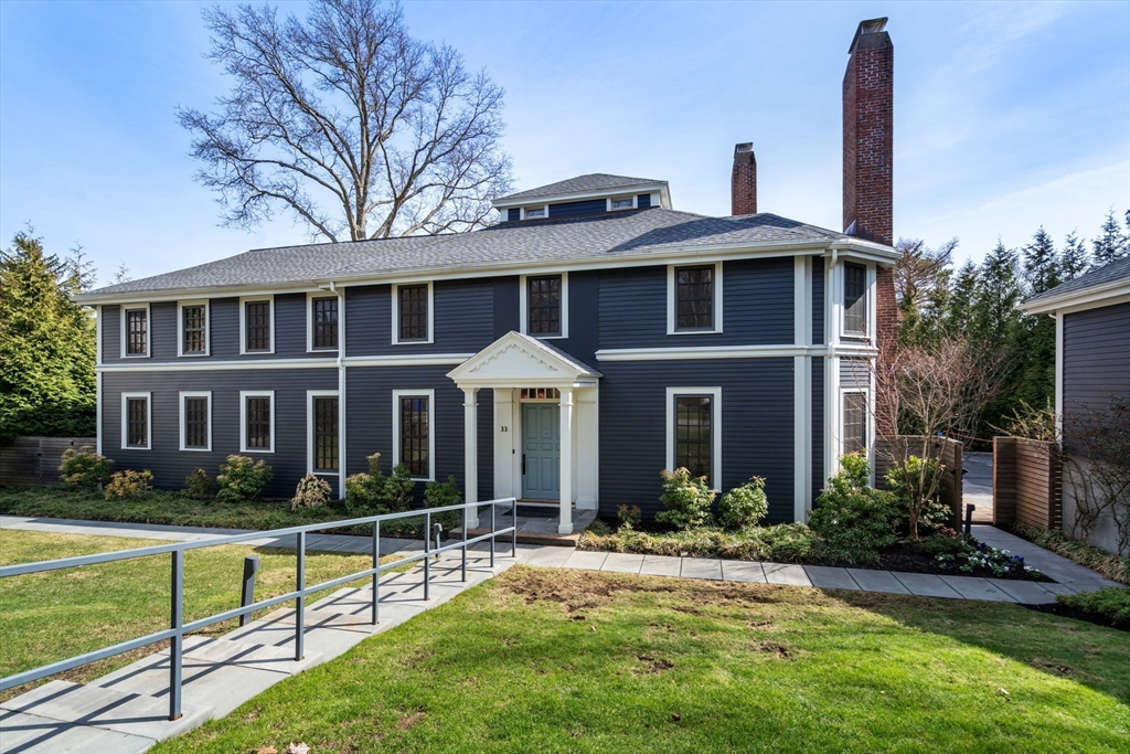 33 Leicester Street Brookline, MA 02445 - Photo 37 of 38 a front view of a house with garden