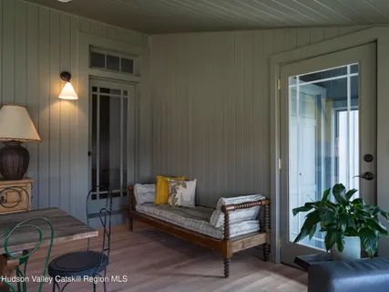 a view of livingroom with furniture and windows