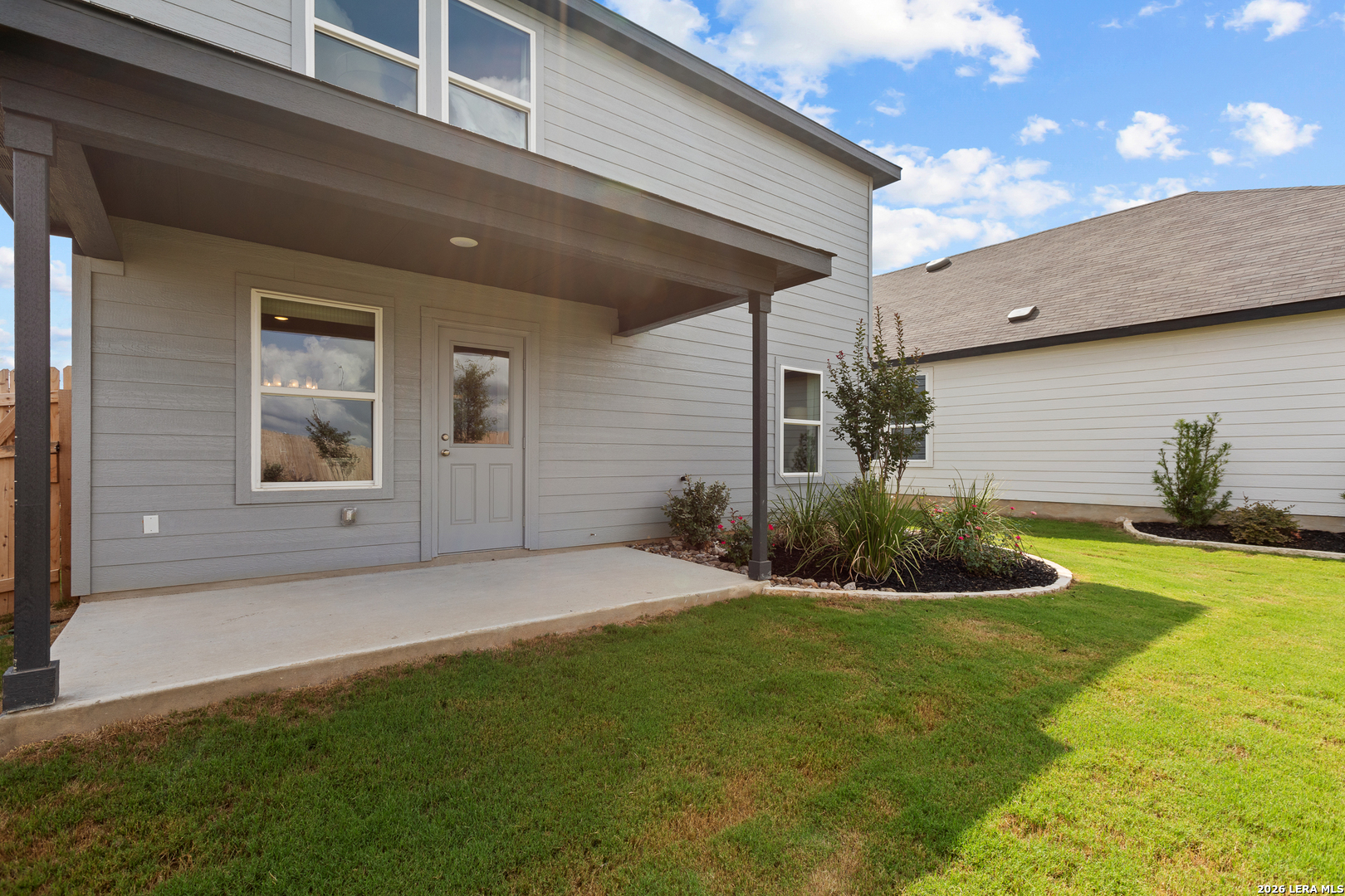 436 Raven Row Marion, TX 78124 - Photo 33 of 35 a front view of a house with garden and yard