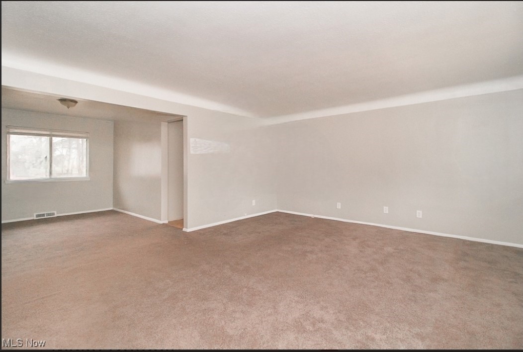 489 Harris Road Cleveland, OH 44143 - Photo 2 of 10 Empty room featuring carpet floors