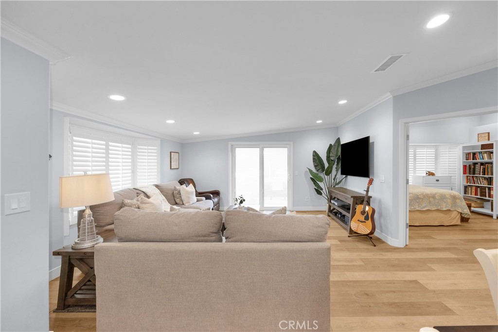 1671 Interlachen Road, Unit 285L Seal Beach, CA 90740 - Photo 7 of 51 Living room shade down