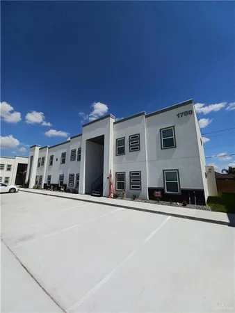 a front view of a building with street