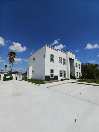 a view of a building with a road