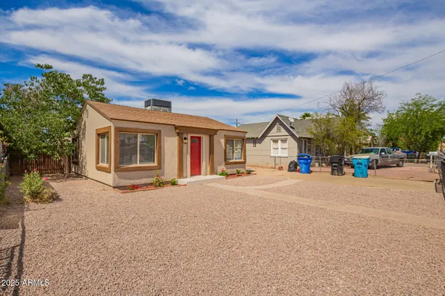 front view of a house with a street