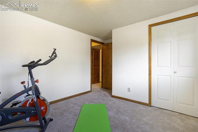 2275 Ramsgate Terrace Colorado Springs, CO 80919 - Photo 34 of 49 Fourth bedroom currently used as an exercise room