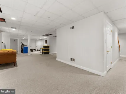 a view of a livingroom and a kitchen