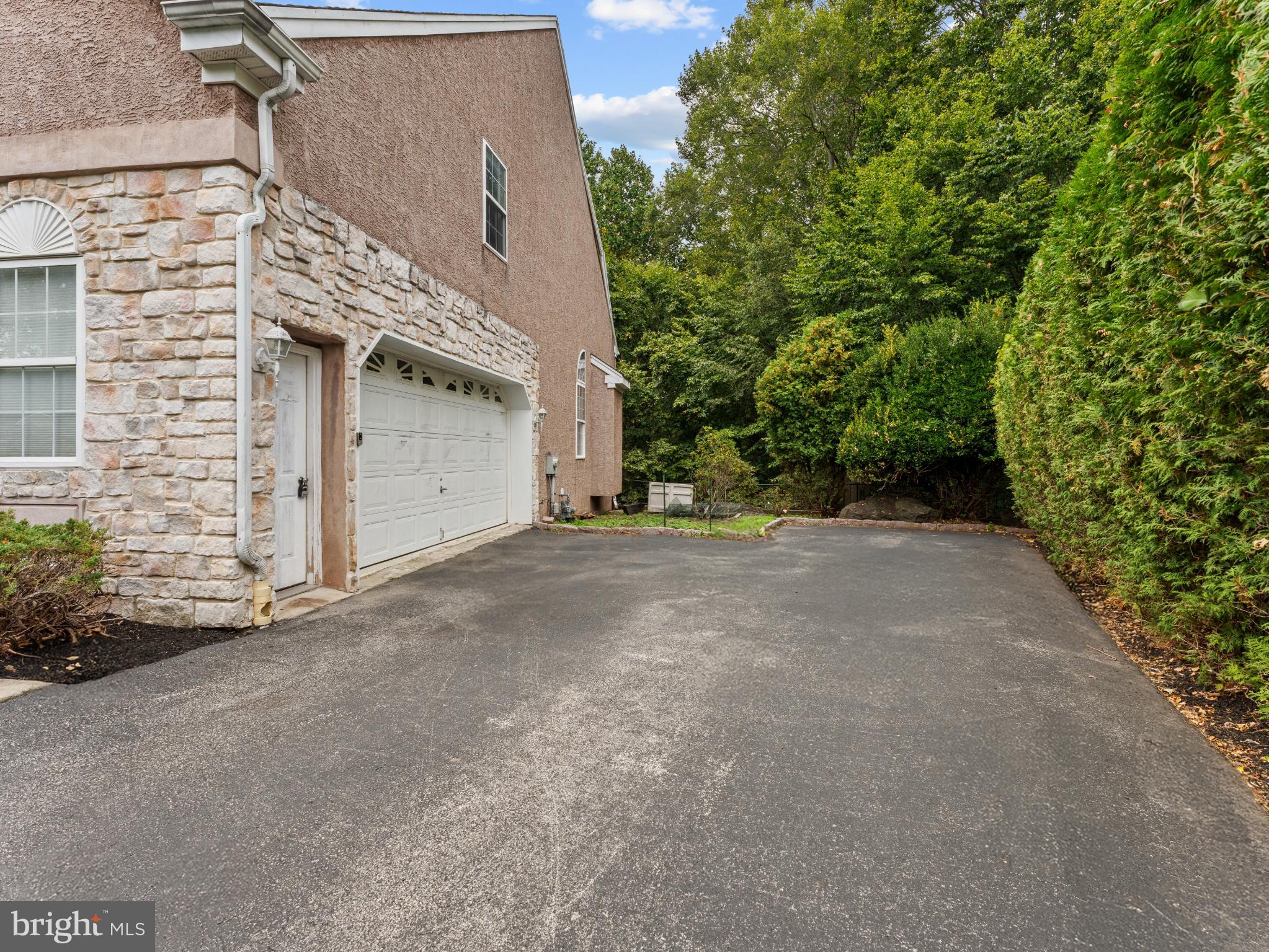 746 Kelli Lane Springfield, PA 19064 - Photo 41 of 41 Oversized Driveway with access to two car garage.