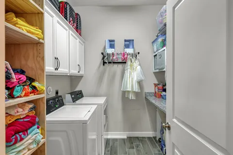 a utility room with dryer and washer